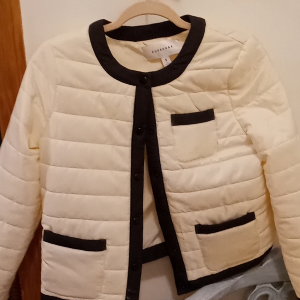 Cream and black button down jacket by Pop Sugat